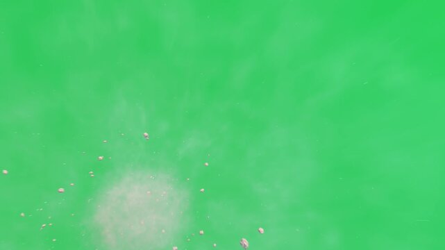 Colliding pale puffs ejecting dust cloud and scattering pebbles for compositing on transparent bg