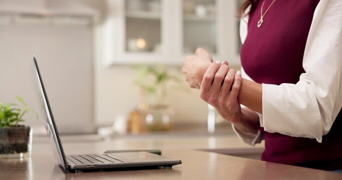Hands, laptop and remote work in home with wrist pain, fatigue or burnout from typing finance report. Tired, woman and freelancer research in house with computer, arthritis and overworked from job.
