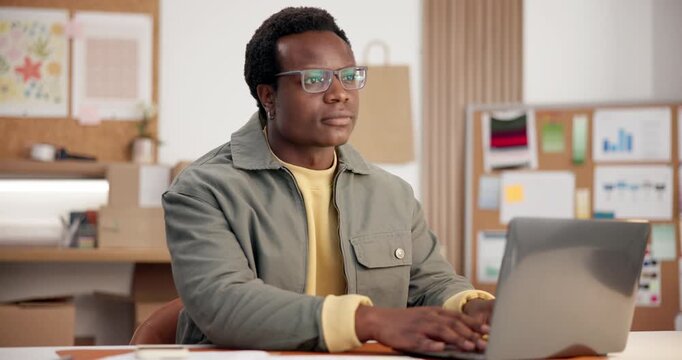 Ecommerce, man and typing in small business with laptop, thinking or customer database for logistics. Black person, sales stats and planning in retail company with computer, supply chain or forecast.