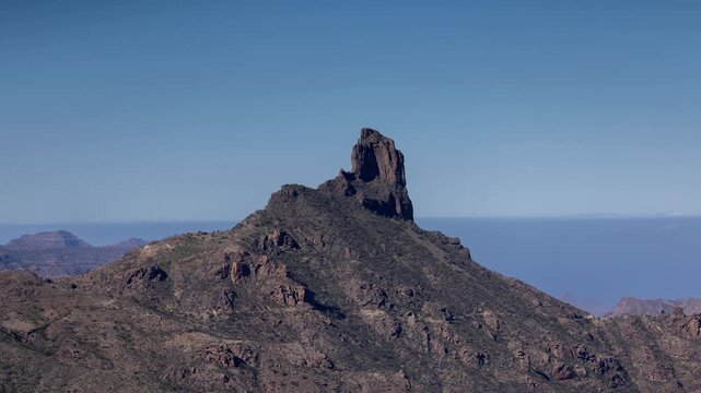 a timelapse of the roque nublo in gran canaria on clear day