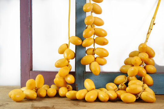 Fresh yellow date palm fruit
