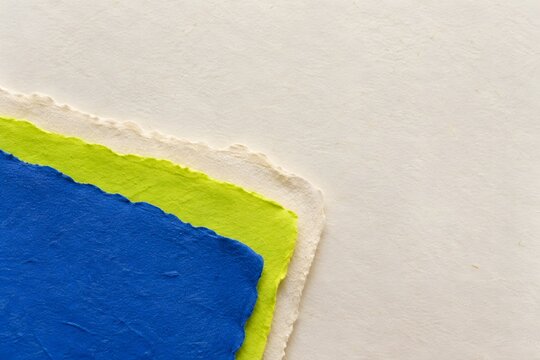 Cobalt lime and cream handmade paper layers