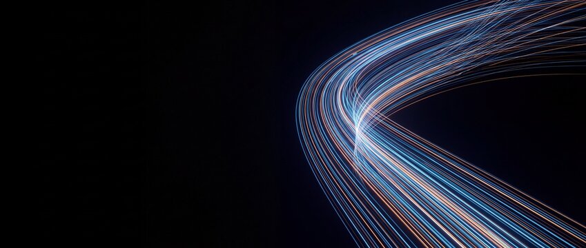 Abstract flowing blue and orange light trails on dark background, representing data stream, technology, motion, and digital network