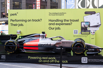 Fototapeta premium NEW YORK, USA – SEPTEMBER 16, 2026: an Audi Revolut F1 Team Formula 1 car display in Times Square beside a Perk advertising panel.