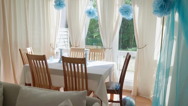 Decorated birthday party room with balloons blue color tilt camera movement inscriptions on the balloons You are the best, Happy Birthday and Love
