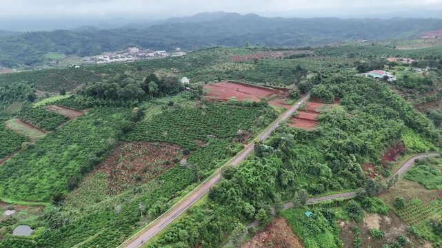 Aerial view of green hills near Ta Dung Lake in Dak Nong, central Vietnam.