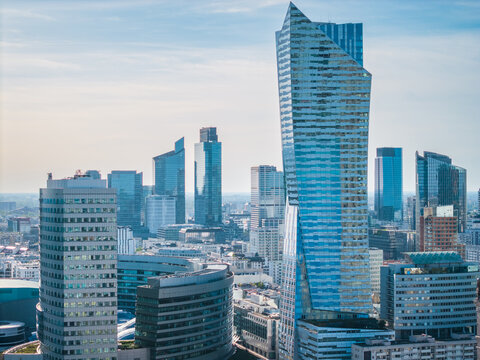 Warsaw city center skyline with Palace of Culture and modern skyscrapers on a sunny summer day. Poland