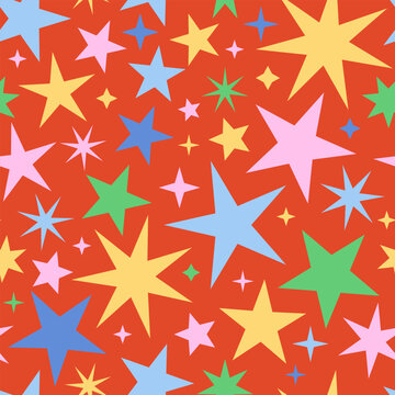 Seamless vector pattern with colorful stars on red background. Holiday design for textile, stationery or wrapping paper