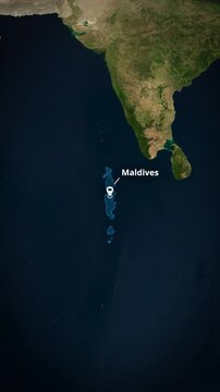 Vertical satellite map zoom to the Maldives with a location pin marker and text. Perfect for short-form social media travel promos, mobile app backgrounds, and digital advertising campaigns.

