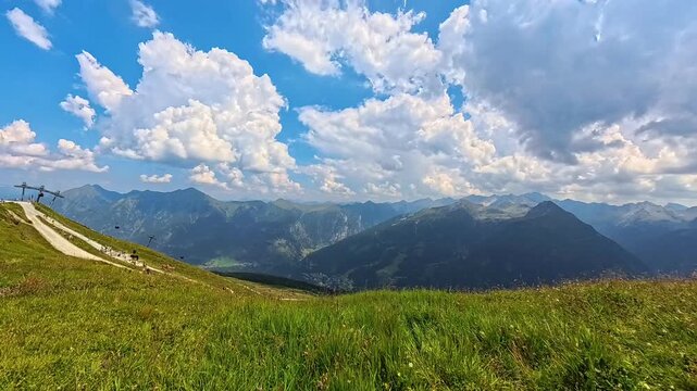 4K Timelapse alpine summer video with moving clouds at Mount Stubnerkogel, Bad Gastein, Gasteinertal valley, Sankt Johann im Pongau, Austria