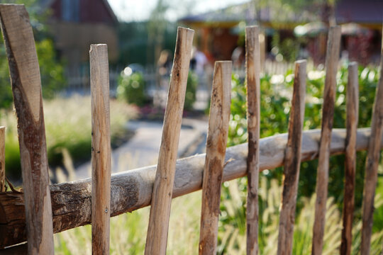 Close up view of an old school picket fence at a farm