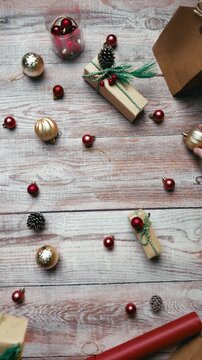 Kraft Paper Gift Box With Twine Against Bokeh Lights