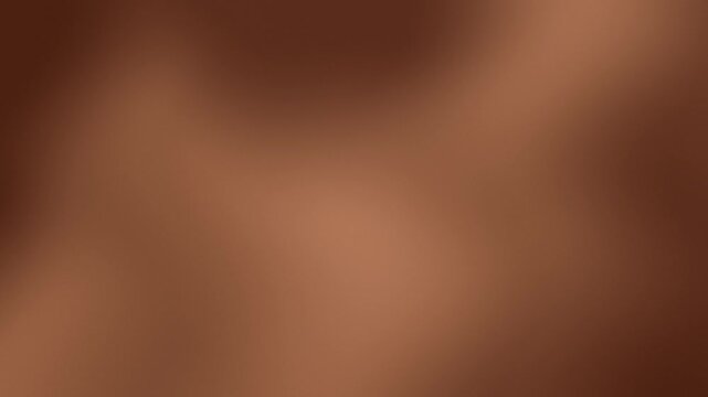A smooth and soft warm brown abstract gradient background with elegant blurred textures suitable for luxury branding, web design, or minimalist layouts.
