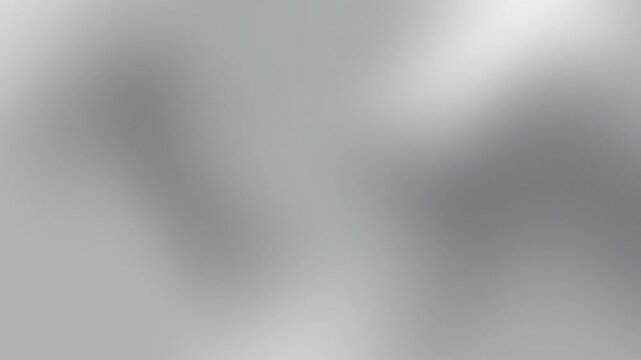 A smooth and minimalist abstract background featuring a silver monochromatic gradient with soft light leaks and blurry textures for professional design projects.