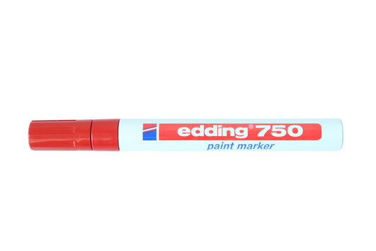 classic edding 750 red paint marker pen with a white barrel body and red cap, isolated on transparent background, germany, M&uuml;nster, september 16, 2026