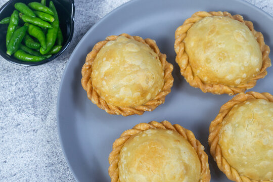 Delicious homemade Indonesian street food pasteluUfo isi bihun served on a grey plate