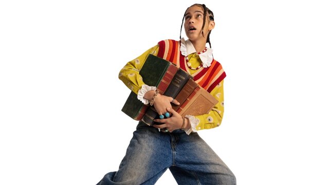 Surprised Student Carrying Heavy Stack of Vintage Books Isolated on White