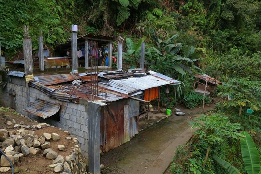 Poverty in Cordillera Administrative Region (CAR) in Luzon island of the Philippines. Hovel home with rusty corrugated metal sheets.