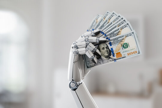 Robotic Hand Holding Stack of Dollar Bills Representing AI Financial Impact