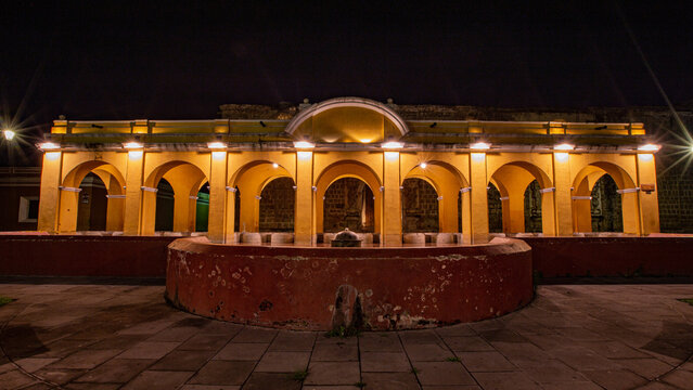 lluminated night view of "Tanque de la Uni&oacute;n" Park. Antigua Guatemala