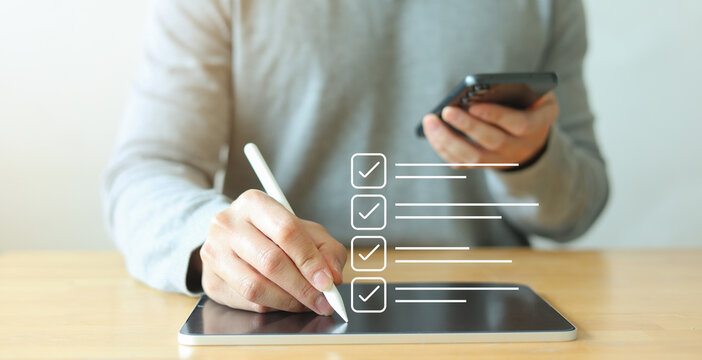 close up customer man hand use smartphone to check online questionnaire survey from website to rate score and share aspect of audience after complete from seminar for business corporation concept