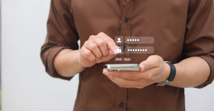 close up man hand type on smartphone to access account on website by input username and password at office for security system of business technology concept