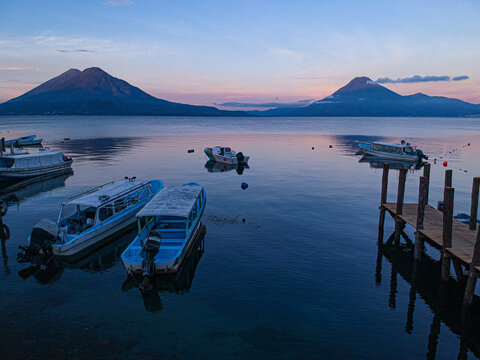 Scenic aerial landscape of Lake Atitlan crater lake and volcanoes in Solola, Guatemala