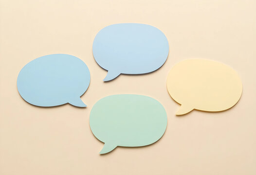 Communication and feedback concept, colorful speech bubbles on a neutral background for social media interaction, dialogue and brainstorming ideas