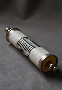 Ancient wisdom and philosophy, traditional scroll with i ching hexagram symbol for divination and spiritual guidance on a dark textured background