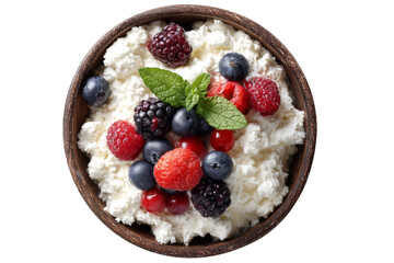 Obraz premium Cottage cheese with fresh berries and mint in rustic wooden bowl isolated on transparent background