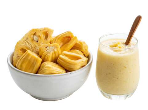 Fresh sliced jackfruit in a bowl and a glass of jackfruit smoothie with fruit bowl exotic fruit tropical fruit drink yellow fruit food photography fruit pulp as transparent object