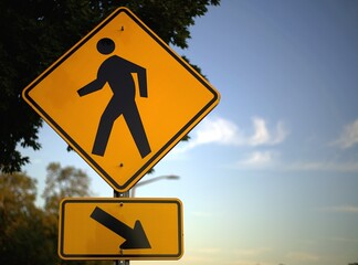 Pedestrian Crossing Sign with Downward Directional Arrow Plaque. © Mohamed