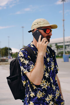 Man Talking on a Phone Outdoors