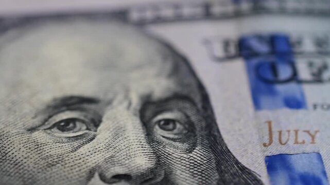 Macro close up moving shot paper texture hundred dollar bills background, money, finances, stock market background, b roll video