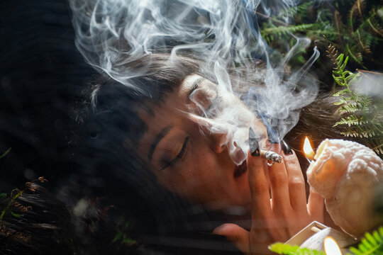 Ethereal Gothic Woman Smoking by Owl Candle at Night