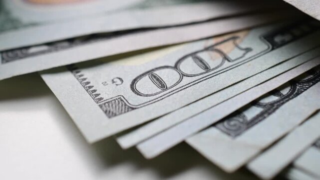 Macro close up moving shot paper texture hundred dollar bills background, money, finances, stock market background, b roll video