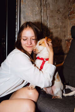 Woman Hugging Her Dog