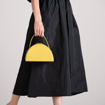 Handbag And Black Dress Fashion Detail