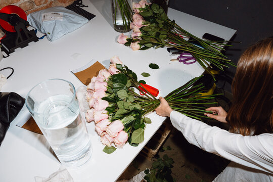 Florist preparing fresh roses