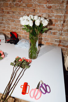 Roses in a Florist Workspace