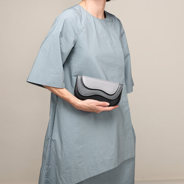 Minimal Pastel Outfit With Leather Clutch