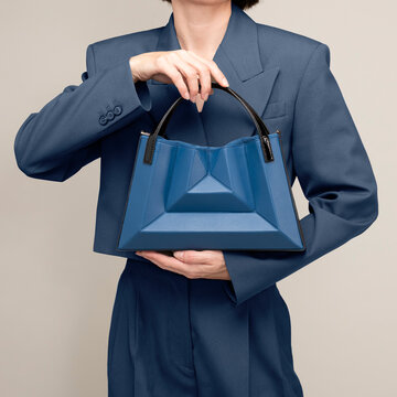 Business Fashion Portrait With Blue Handbag
