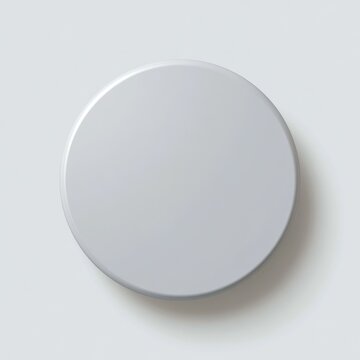 Close-up gray circular button with subtle bevel and empty center, ideal for UI elements