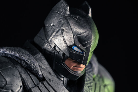 DC Batman armored superhero action figure cowl head detail with glowing blue eye