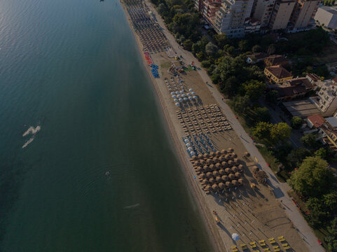 Aerial view along Pogradec beach and waterfront promenade