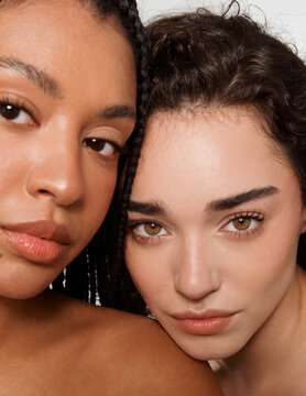 Two Women Posing Close Together for a Photo