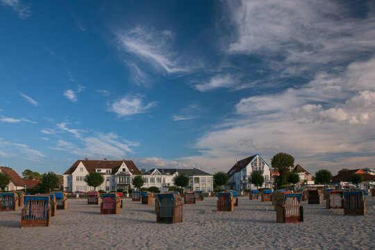 Laboe promenade and sandy beach with traditional beach chairs, Germany
