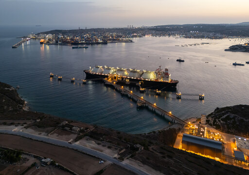Aerial view of Delimara LNG terminal and power plant in Malta at dusk.