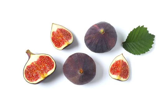 Fresh ripe figs on white background. Healthy tropical fig fruit. Top view