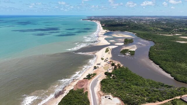 Vista a&eacute;rea de Barra de Gramame, Para&iacute;ba, com encontro do rio e o mar (Aerial view of Barra de Gramame, Para&iacute;ba, Brazil, where the river meets the ocean)